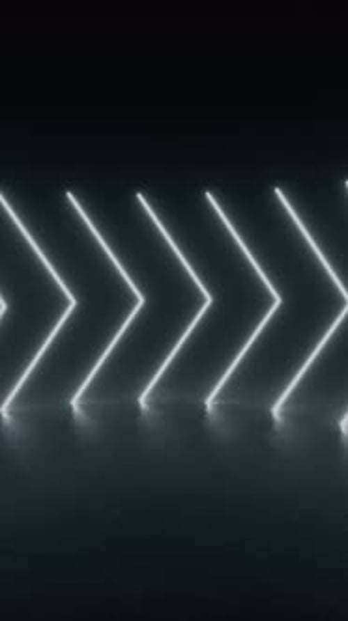 A tunnel of neon lights glows