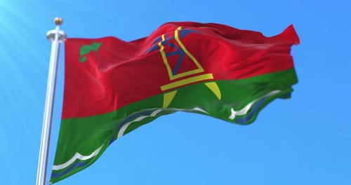 Realistic Waving Flag against a Clear Blue Sky