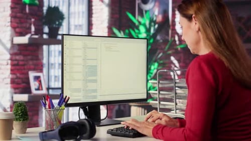 Woman Engaging with an Intelligent AI Chatbot to Complete Work Related Tasks