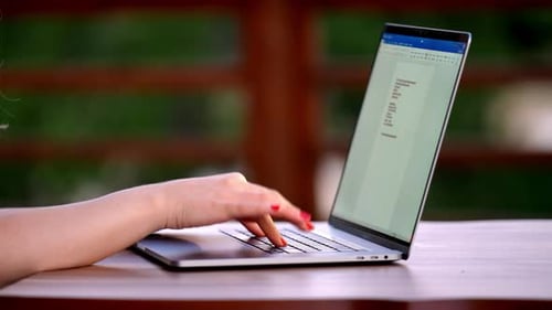 Writing on Laptop