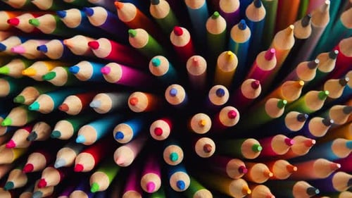 Top View of Sharpened Multicolored Drawing Pencils Rotating in a Circle