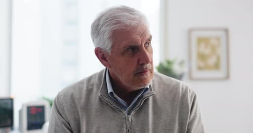 Stress, patient and senior man in hospital room, think and waiting for appointment