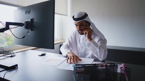 businessman working in a modern office in the united arab emirates.