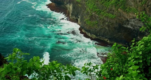 Huge Ocean Waves Hit the Volcanic Rocks Uluwatu Beach