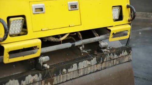 Process of asphalting road construction infrastructure by compressing, compacting, leveling and smoo