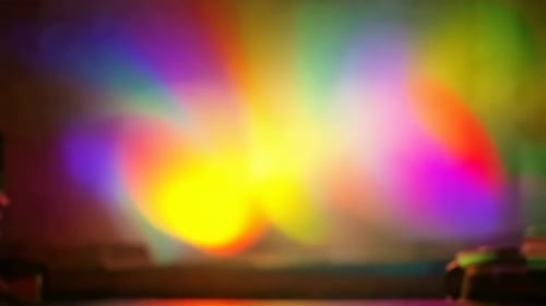 Abstrakte lebendige Bewegung bunter Disco-Lichtreflexe