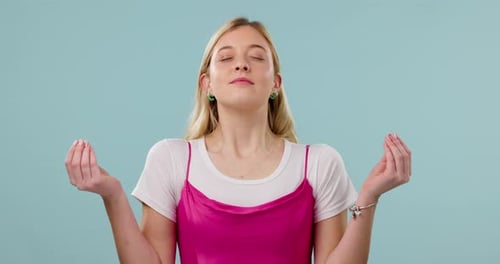 Woman, meditation and breathing, lotus and mindfulness in studio, self care