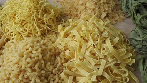 Variety of Uncooked Pasta Types Close Up