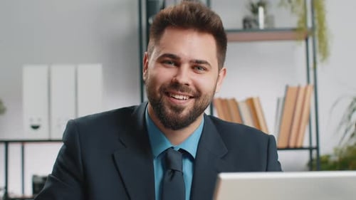 Closeup Businessman Freelancer at Office Workplace Working on Laptop Computer Sends Online Messages