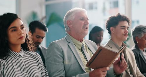 Diverse Group Attending a Corporate Meeting
