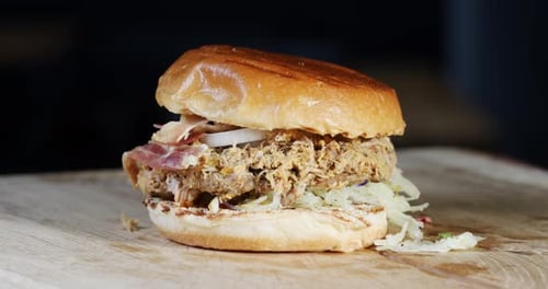 Delicious Pulled Pork Sandwich Piled High with Bacon