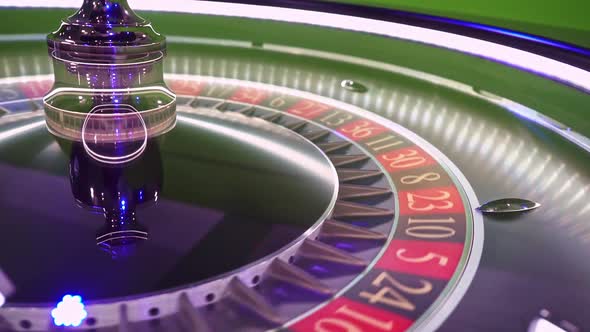 Roulette wheel spinning and ball landing on number, Industrial Stock ...