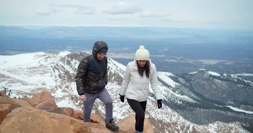 Couple Hiking to Snowy Mountains, Rocky Mountain Range Hike Adventure