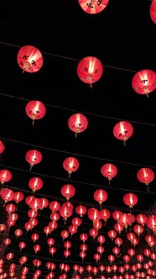 Rows of Traditional Red Chinese Lanterns at Night