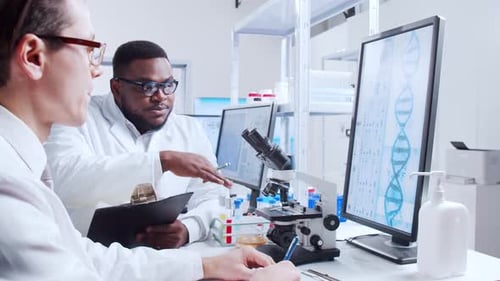 Scientists Collaborate on Medical Research in Laboratory