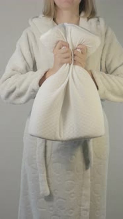 Young Adult Shows White Pillow Quality