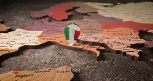 Italy - Travel concept pushpin on the world map. The location point on the map points to Rome the
