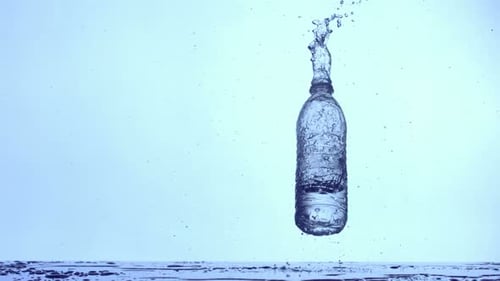 Water bottle is dropped and splashes