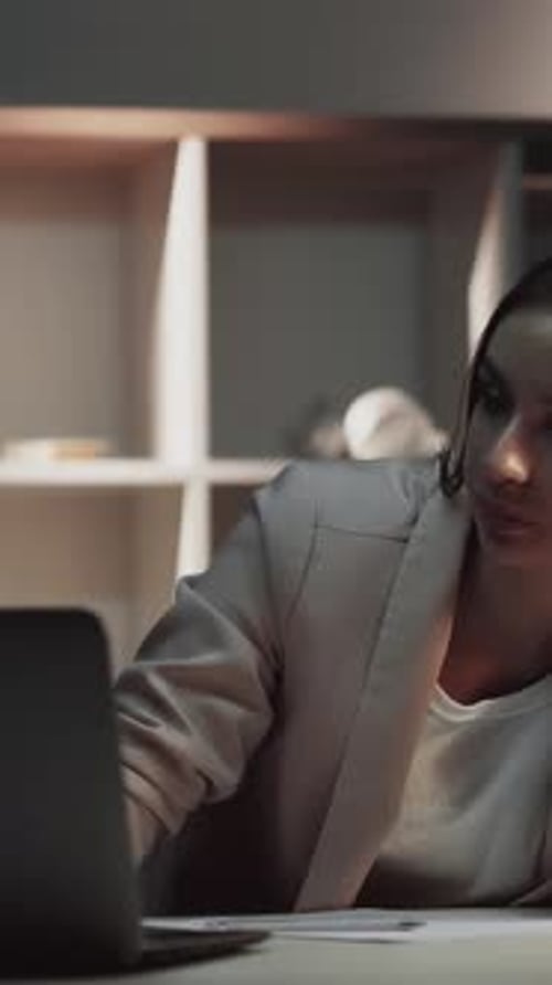 Tired Woman Closing Laptop in Office Workplace