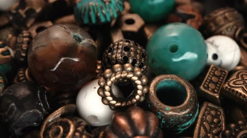 Close-up View of a Pile of Colorful Vintage Beads and Ornaments