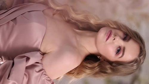 Beautiful Woman Posing in Pink Gown