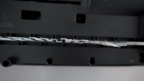 Shredding Confidential Documents in an Office Shredder