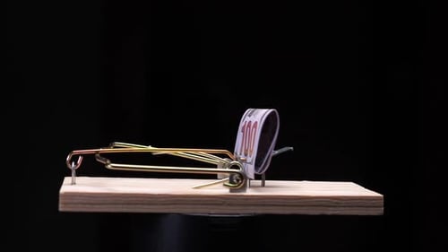 Symbolic Trap with Money As Bait in Financial Concept
