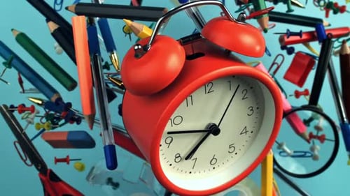 Alarm Clock and School Supplies Fly and Fall Filmed on a Highspeed Camera at 1000 Fps