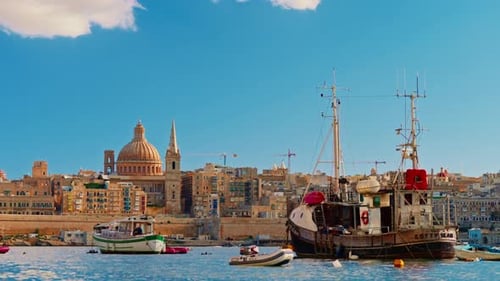 View of Valletta's of Capital City of Malta at Sunny Day Marsamxett Harbour with the View on