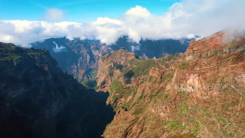 Amazing panorama of the stunning rocks covered with some grass.