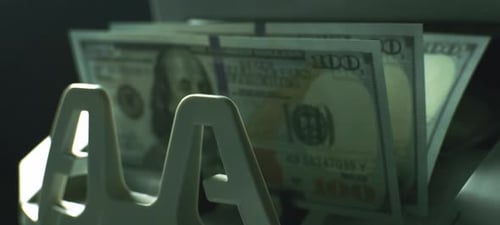 Money Counting Machine Counts Hundred Dollar Bills