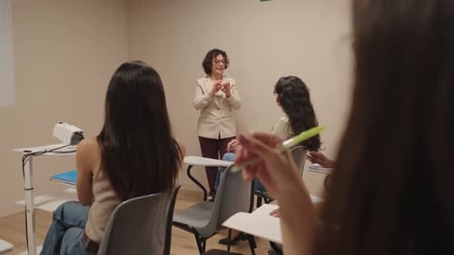 University Professor Teaching Students in a Classroom