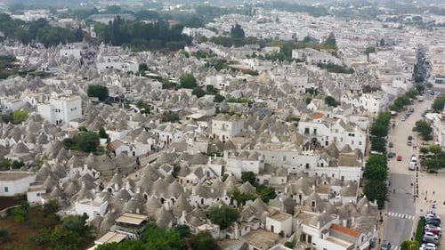 The traditional Trulli houses in Alberobello city, Apulia, Italy. Cityscape over the traditional roo