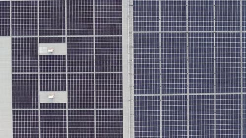 Aerial View of Solar Panels on Building Roof