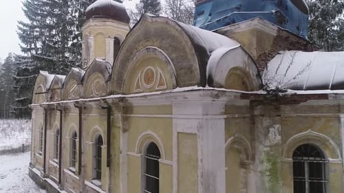 Old abandoned church on the edge of the forest