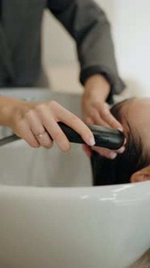 Hair Salon Client Gets a Relaxing Scalp Massage and Hair Wash