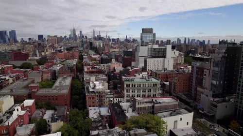 Aerial View Over Brooklyn Borough With Manhattan Skyline In The Distance. Circle Dolly, Establishing