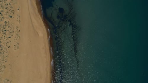 Aerial View Sand Beach and Sea Water Surface. Top View Ocean Coast