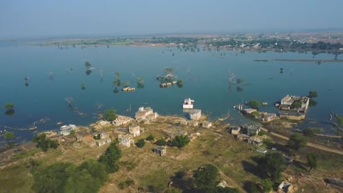 Aerial drone shot of a flooded village in India