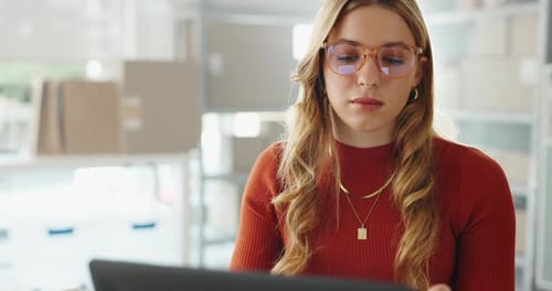 Delivery, supply chain and woman on computer for shipping, distribution and courier service