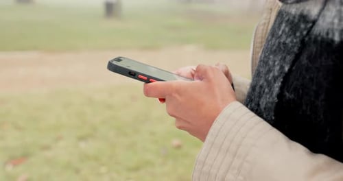Hands Using Smartphone in Urban Environment