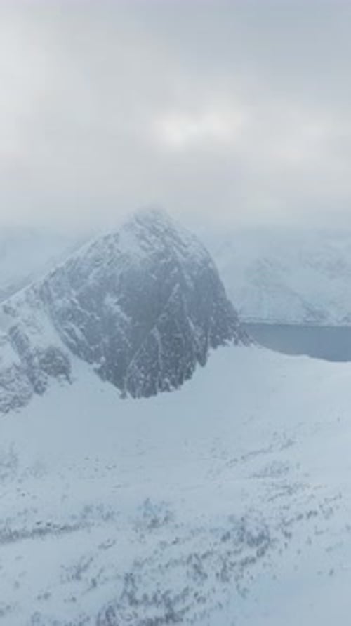 Aerial view of snow covered mountain, Norway.