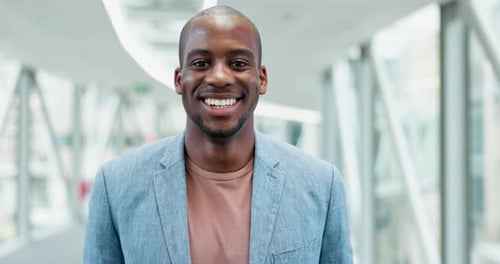 Smiling Man in Modern Office Setting