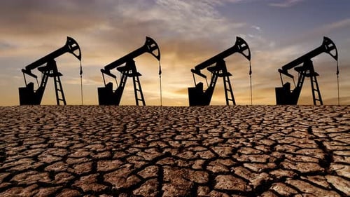 Oil Pump on a Sunset Background World Oil Industry Timelapse