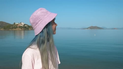 Portrait of a Girl on the Background of the Sea