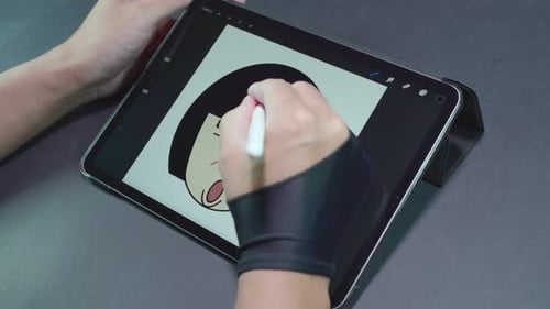 Artist Draws Cartoon Character on Tablet