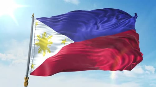 Realistic Waving Philippines Flag Against a Blue Sky Background