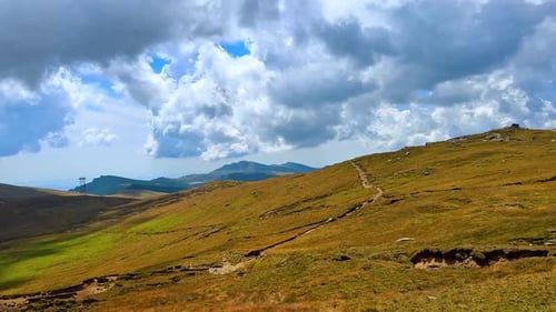 Scenic hiking path across Bucegi plateau.