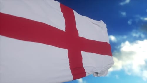 England Flag Waving in a Clear Blue Sky