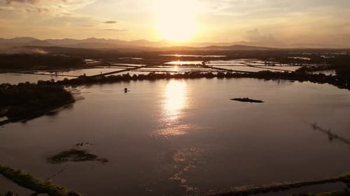 Scenic Landscape of Lakes at Sunset with Sun Path in Evening